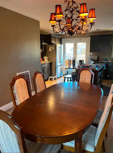 Dining table with leaf, 6 chairs and 2 corner china cabinets.