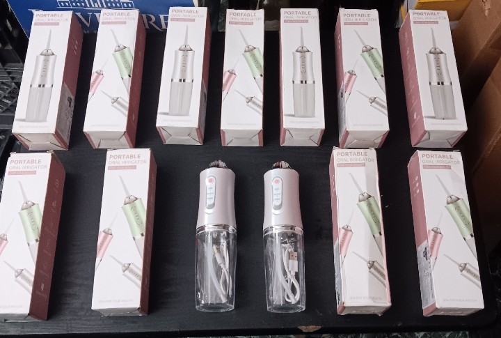 PORTABLE ORAL IRRIGATOR (EACH)